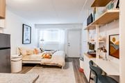 Kissimmee apartment for rent - a bedroom with a bed and a desk in a small room at The Teale, Kissimmee, FL, 34746