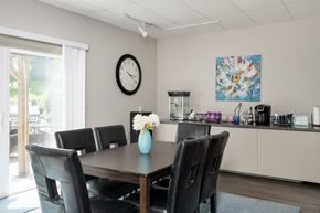 Grand Rapids apartment for rent - A dining room with a table set for six.