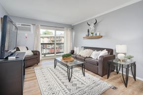 Okemos apartment for rent - Living room at Berrytree Apartments near Michigan State University in East Lansing, MI