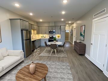 Grand Rapids apartment for rent - a kitchen and living room with a table and chairs