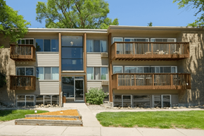 East Lansing apartment for rent - A building with a balcony and a door.