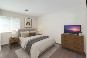 Grand Rapids apartment for rent - A bedroom with a bed, nightstand, and a television on a dresser.