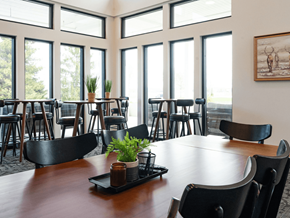 Hudsonville apartment for rent - A large conference room with a long table and chairs.