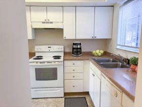 Lansing townhouse for rent - Spacious Kitchen in East Lansing Apartments near Michigan State University | Holiday Townhomes