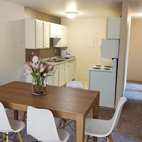 Mason apartment for rent - Kitchen and dining at Mason Hills Apartments in Mason, MI