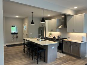 Okemos triplex for rent - Kitchen at Okemos Grand Reserve Apartments in Okemos, MI
