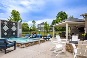 Dewitt apartment for rent - Pool and hot tub at Quarry Apartments and Townhomes in DeWitt Michigan