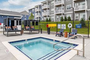 Traverse City townhouse for rent - Pool, hot tub and pool deck at apartments in Traverse City | Bayview of Traverse City