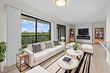 Belleville apartment for rent - A living room with a white couch and a coffee table.