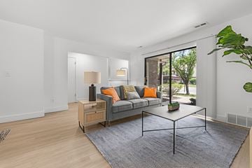 Westland apartment for rent - A living room with a grey couch and a coffee table.