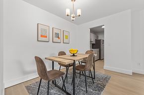 Westland apartment for rent - A dining room with a table and chairs.