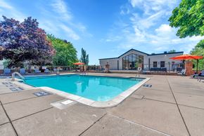 Rochester Hills apartment for rent - Pool and Sun Deck at Rochester Club Apartments - Rochester, MI, Rochester Hills, MI