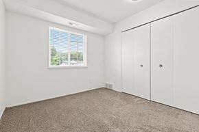 Westland apartment for rent - a bedroom with white walls and carpet and a window