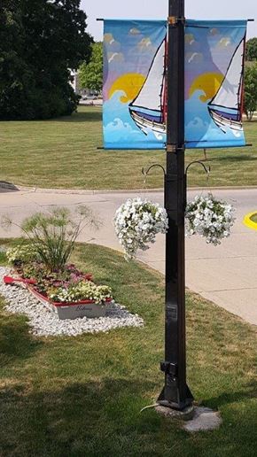 Harrison Twp apartment for rent - a pole with a painting of a sailboat on it