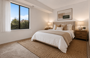 Clinton Twp apartment for rent - A bedroom with a large bed and a window overlooking trees. at Park On Canal Apartments - Clinton Twp, MI Apartments, Michigan, 48038