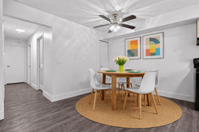 Canton townhouse for rent - A dining room with a round table and chairs.