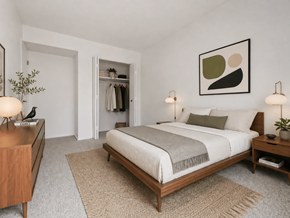 West Bloomfield apartment for rent - A bedroom with a bed, nightstand, and a painting on the wall.