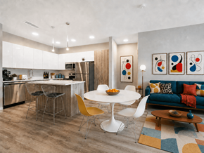 White Lake apartment for rent - A modern kitchen with a dining table and chairs.