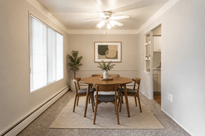 Saginaw apartment for rent - A dining room with a table and chairs.