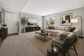 Flint apartment for rent - A living room with a couch, chair, and coffee table.