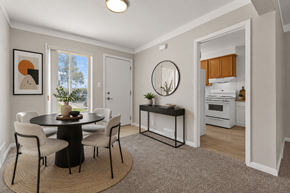 Oak Park townhouse for rent - A dining room with a round table and chairs.