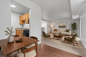 Saline apartment for rent - A modern dining room with a wooden table and chairs.