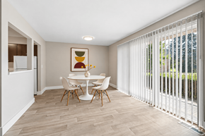 Rochester Hills apartment for rent - A dining room with a white table and chairs.