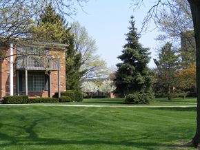 Southgate apartment for rent - a lawn in front of a brick building
