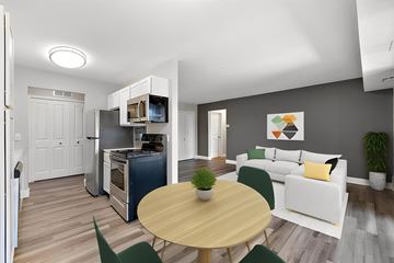 Troy apartment for rent - a living room and dining room with a table and chairs