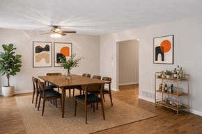 Grand Rapids townhouse for rent - A dining room with a wooden table and chairs.