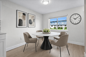 Canton townhouse for rent - A dining room with a table and chairs.