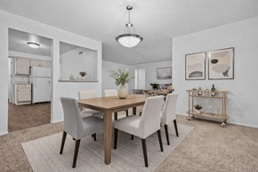 Farmington Hills apartment for rent - A dining room with a table and chairs.