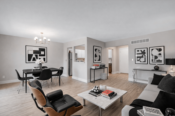 Rochester Hills apartment for rent - A modern living room with a dining table and chairs.
