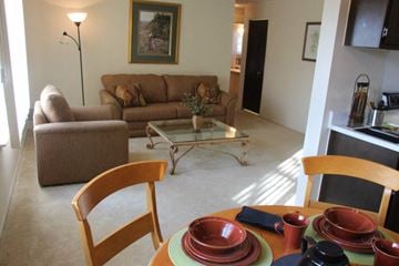 Southgate apartment for rent - a living room with a table and a couch