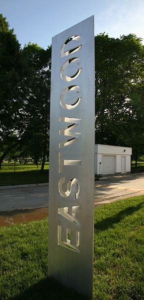 Ames townhouse for rent - A large metal sign with the letters E, S, T, I, M, G, O, N on it.