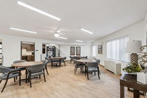 Des Moines apartment for rent - A dining room with a table and chairs.