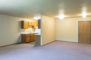 Spirit Lake apartment for rent - A kitchen area with a sink and cabinets.