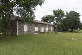 Milford apartment for rent - A house with a lawn in front of it.