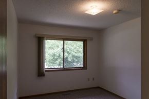 Lake Park apartment for rent - A room with a window and a ceiling light.