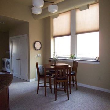 Spencer apartment for rent - A dining room with a table and chairs.