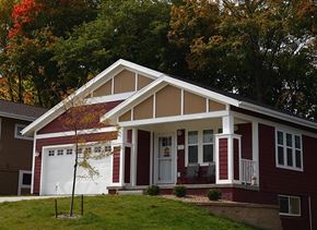 Cedar Rapids apartment for rent - A red house with a white door and windows.