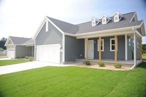 Cedar Rapids apartment for rent - A grey house with a white garage door.
