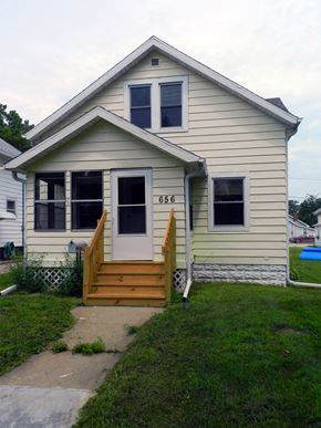 Cedar Rapids apartment for rent - A house with a white door and windows with the number 656 on the window.
