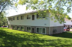 Sioux City apartment for rent - A two-story house with a white siding and grey trim.