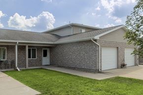Mt. Vernon apartment for rent - A house with a grey roof and a white garage door.