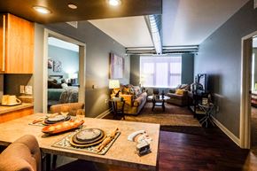 West Des Moines apartment for rent - A dining room with a table set for a meal.