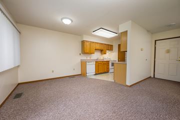 Lake Park apartment for rent - A kitchen area with a counter and cabinets.