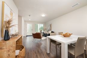 Spirit Lake apartment for rent - A dining room with a white table and chairs.