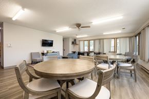 Spencer apartment for rent - A modern dining room with a large table and chairs.