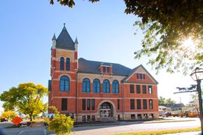 Clinton apartment for rent - Roosevelt School is a two story brick building with large historic windows and a tower in the northeast corner of the building.